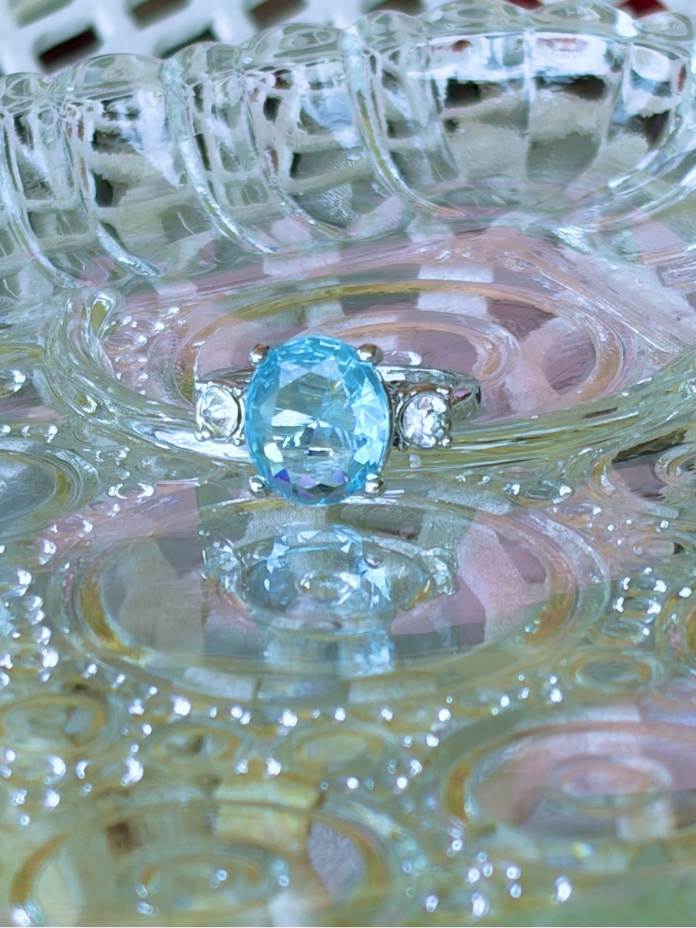 Silver Ring with Sky Blue Oval Gem and Accent Stones